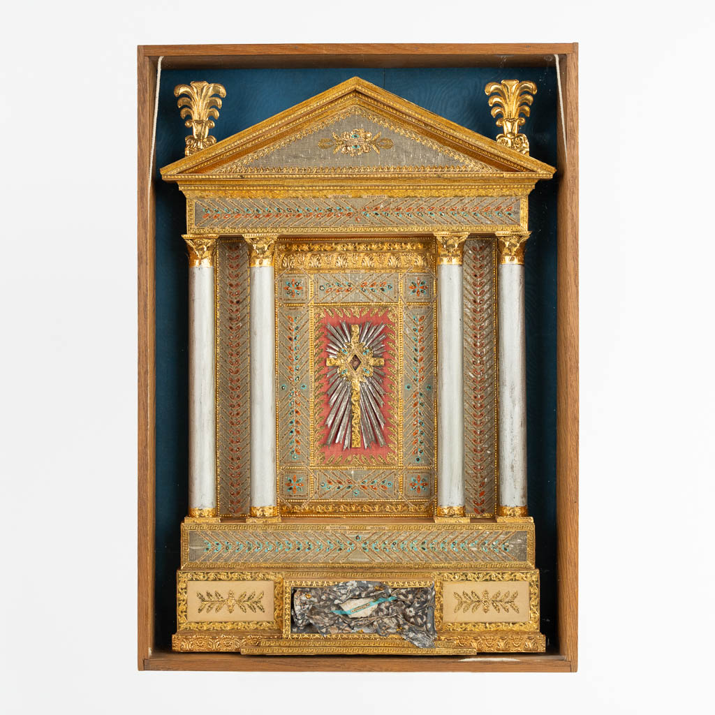 A large reliquary calendar, added with a relic of the True Cross and Objects of passion. 19th C.