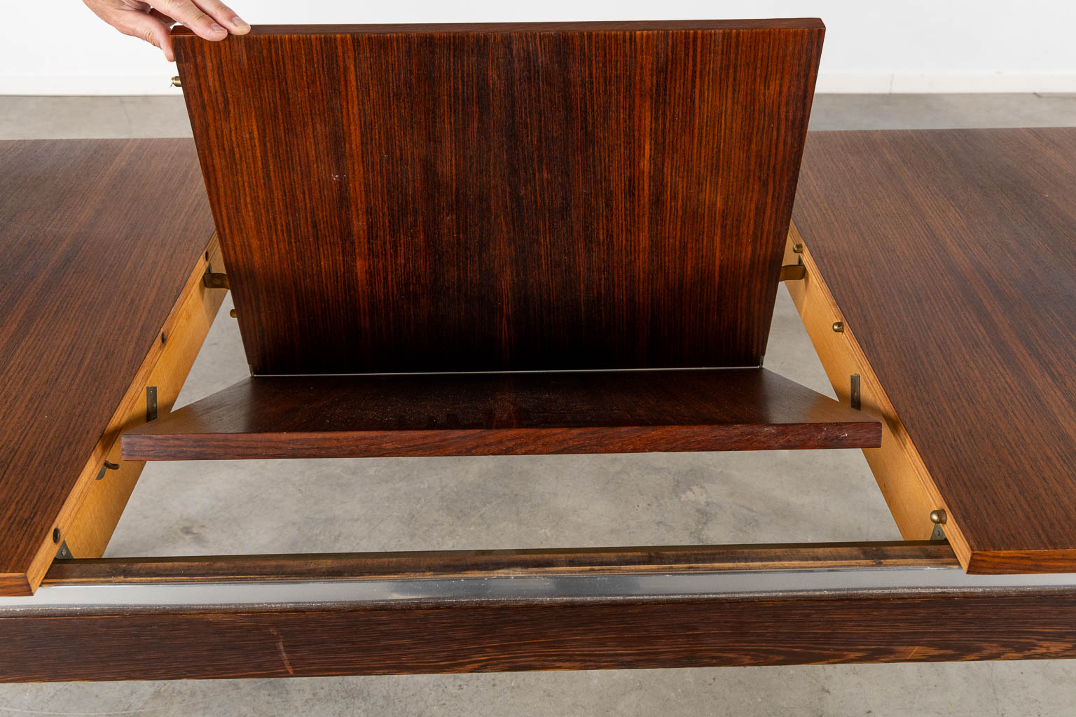 A mid-century table, veneer and chomed metal. By Roger De Winter. (L:84 x W:161 x H:74 cm)