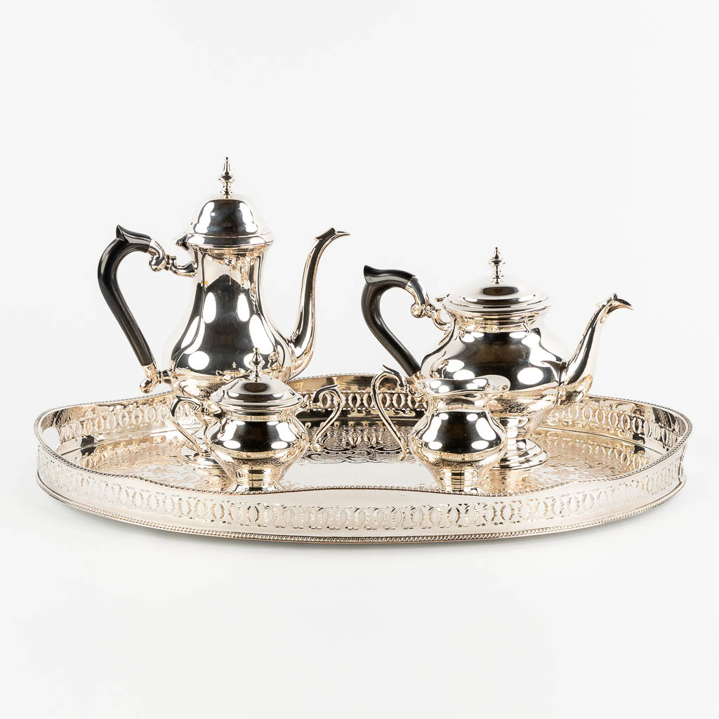 A silver-plated coffee and tea service on a platter. (L:41 x W:61 cm)