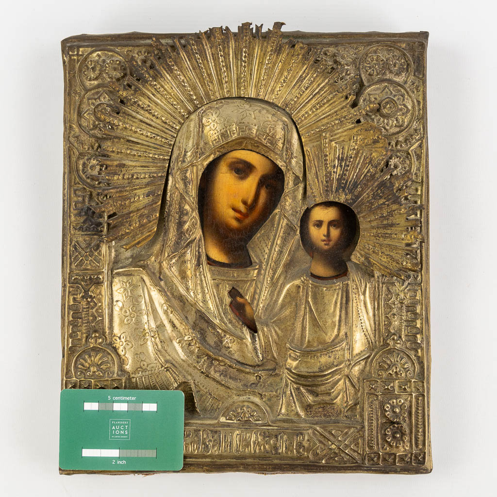 Three Russian icons of which 2 with a silver-plated rizza. 19th C. (W:26 x H:32 cm)