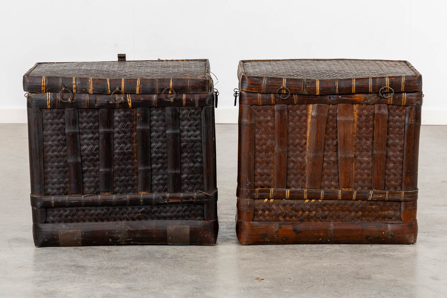 A decorative Oriental pair of side tables, woven. Late 19th/circa 1900. (L:44 x W:59 x H:53 cm)