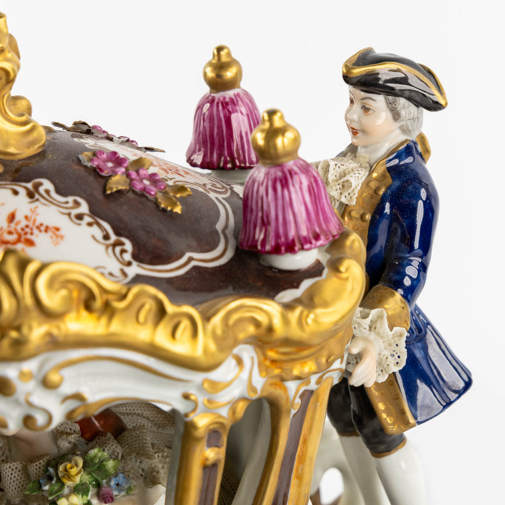 Unterweissbach, a large horse drawn carriage, polychrome porcelain. (L:31 x W:78 x H:32 cm)