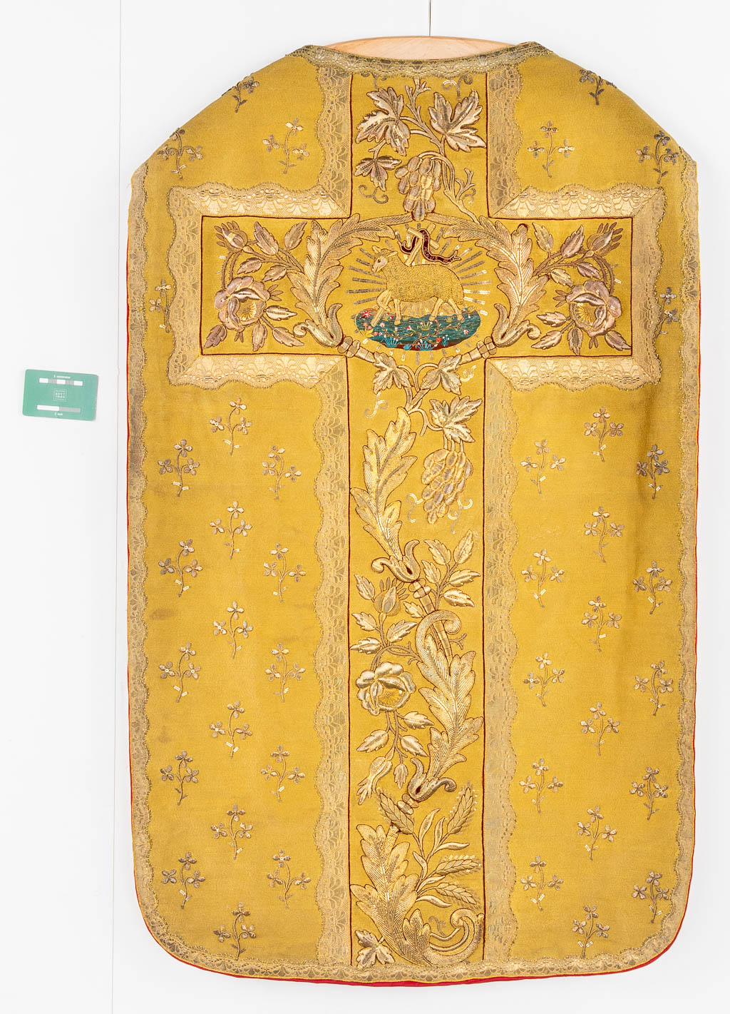 Three Roman Chasubles, Two stola, two pillows and a Humeral Veil. Thick gold thread embroideries.