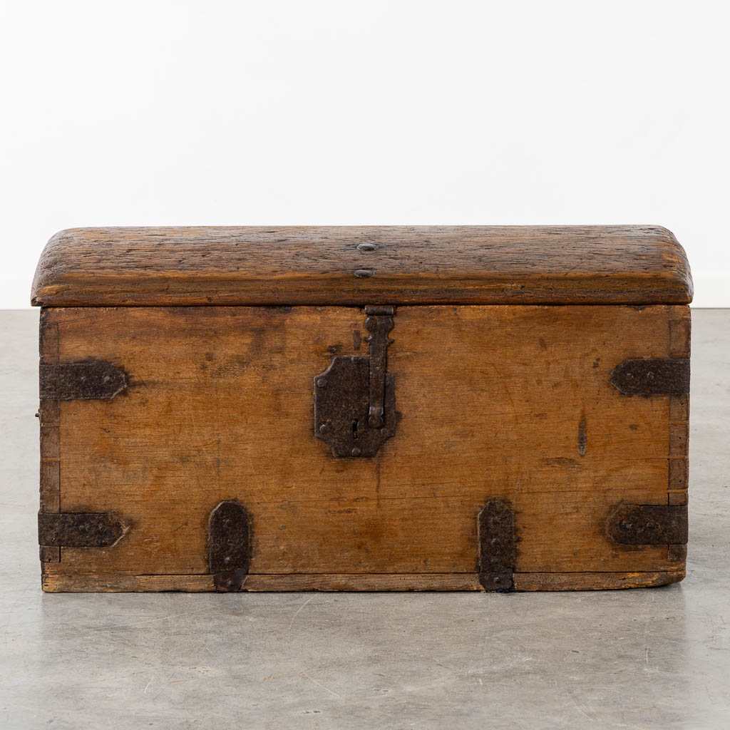 An antique chest with wrought iron hardware, circa 1700. (L:52 x W:93 x H:48 cm)