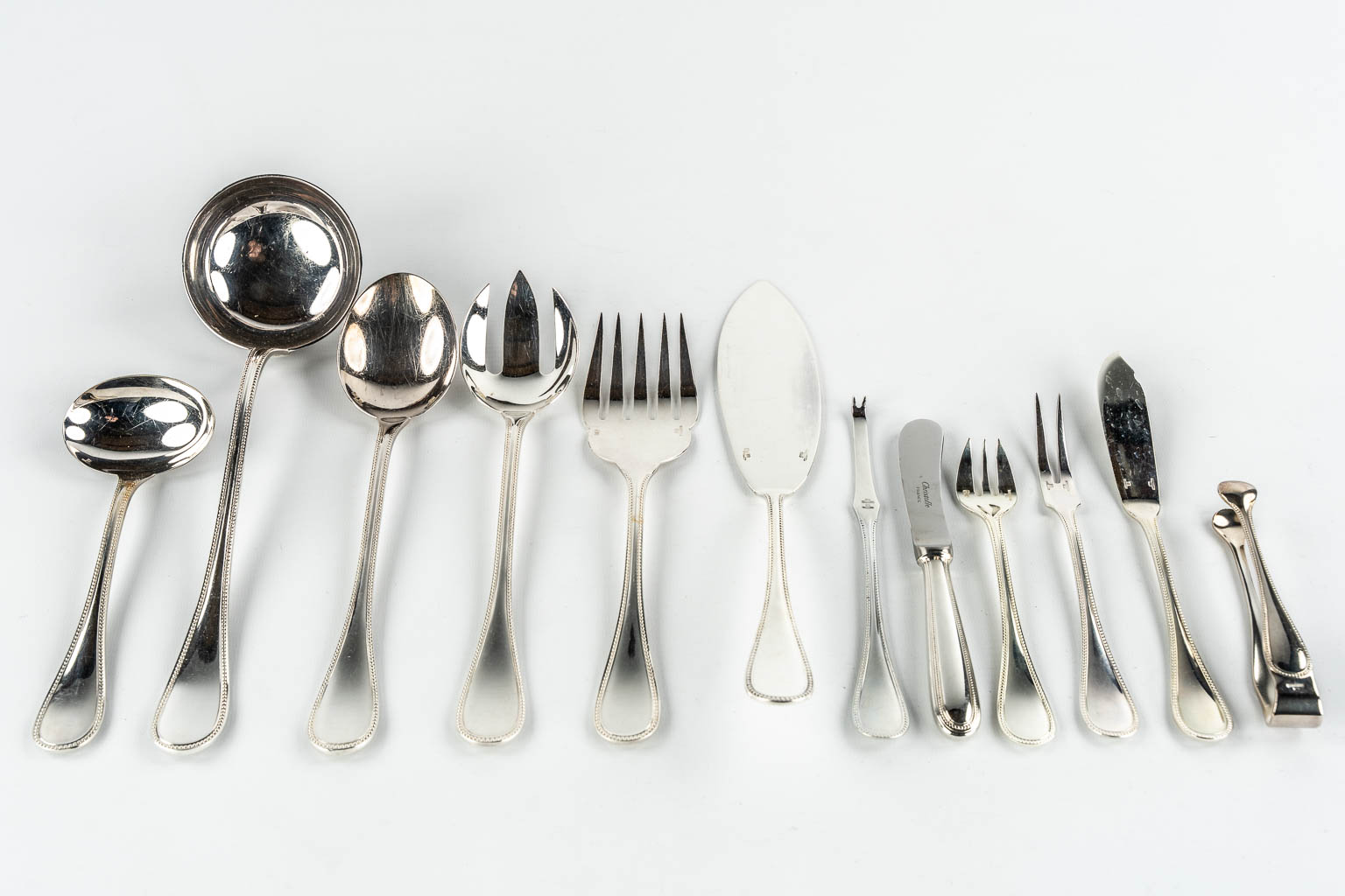 Christofle 'Perles' a 142-piece silver-plated cutlery in a Christofle chest with drawers. 