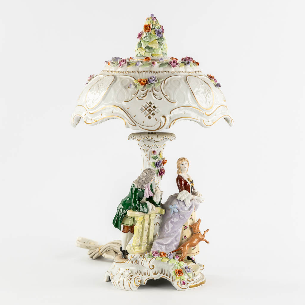 PMP, A polychrome porcelain table lamp, 20th C. (H:56 x D:34 cm)