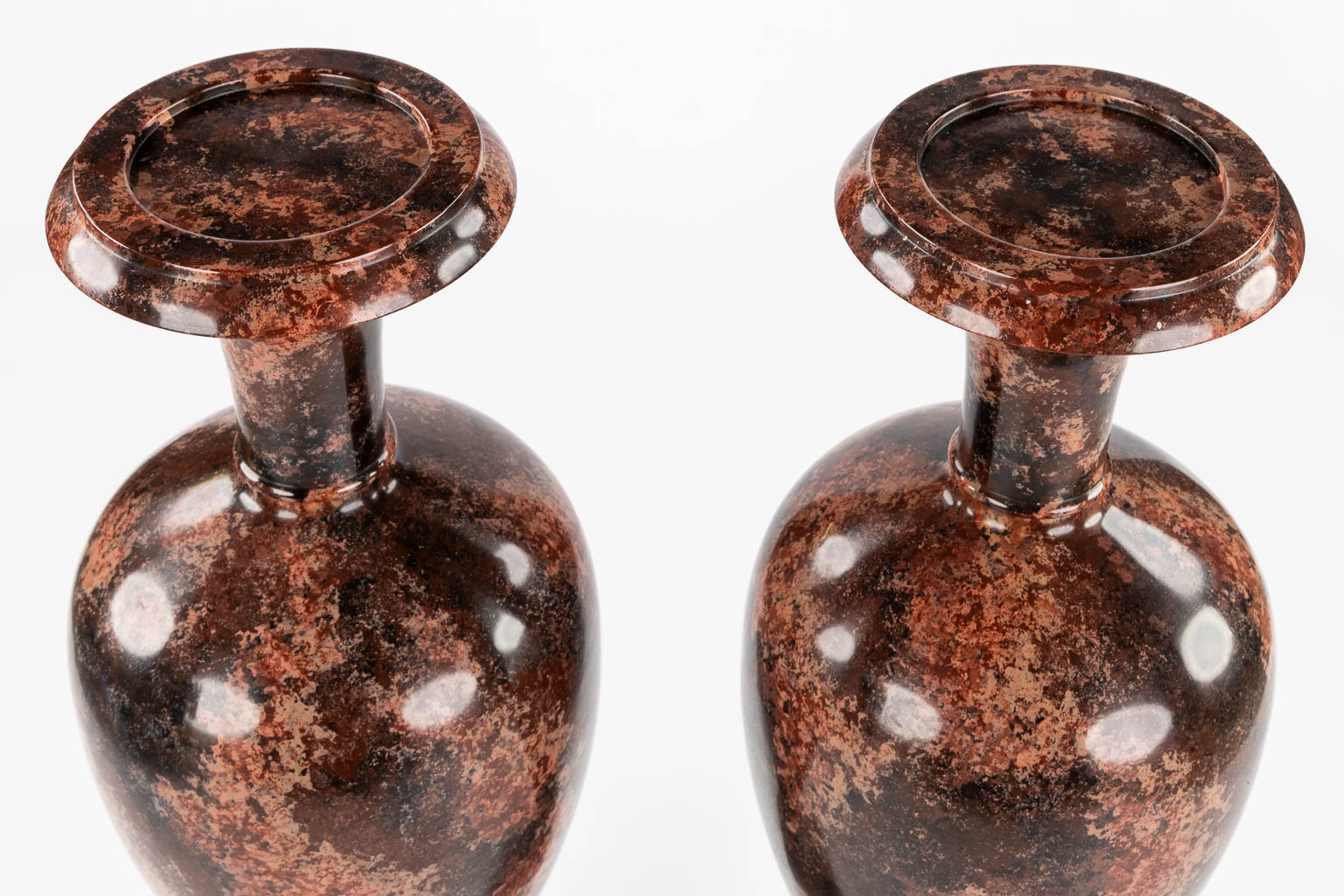 a pair of vases, wood turned and with a 'Faux Marble' decor, 20th C.