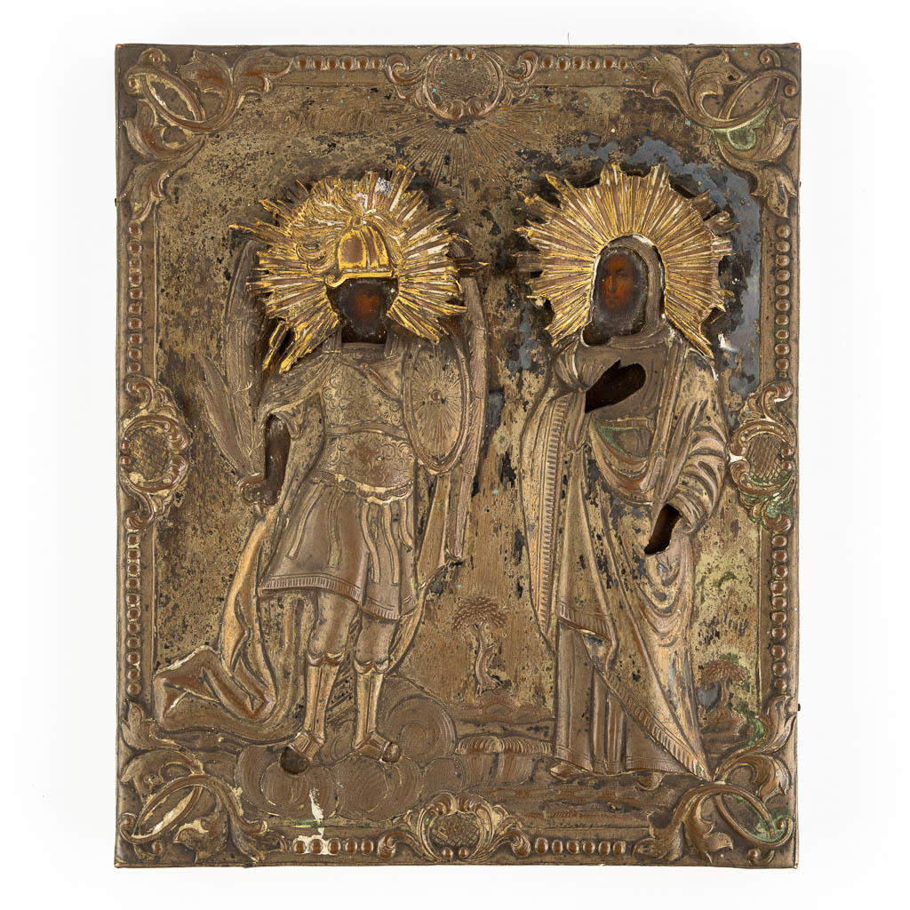 Three Russian icons of which 2 with a silver-plated rizza. 19th C. (W:26 x H:32 cm)