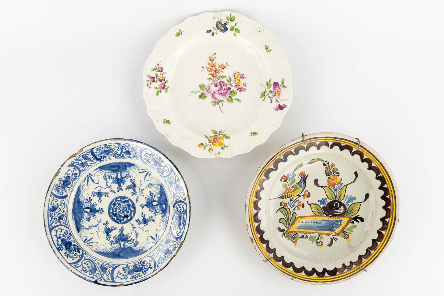 Seven Faience plates, France, 18th and 19th C. (D:42 cm)