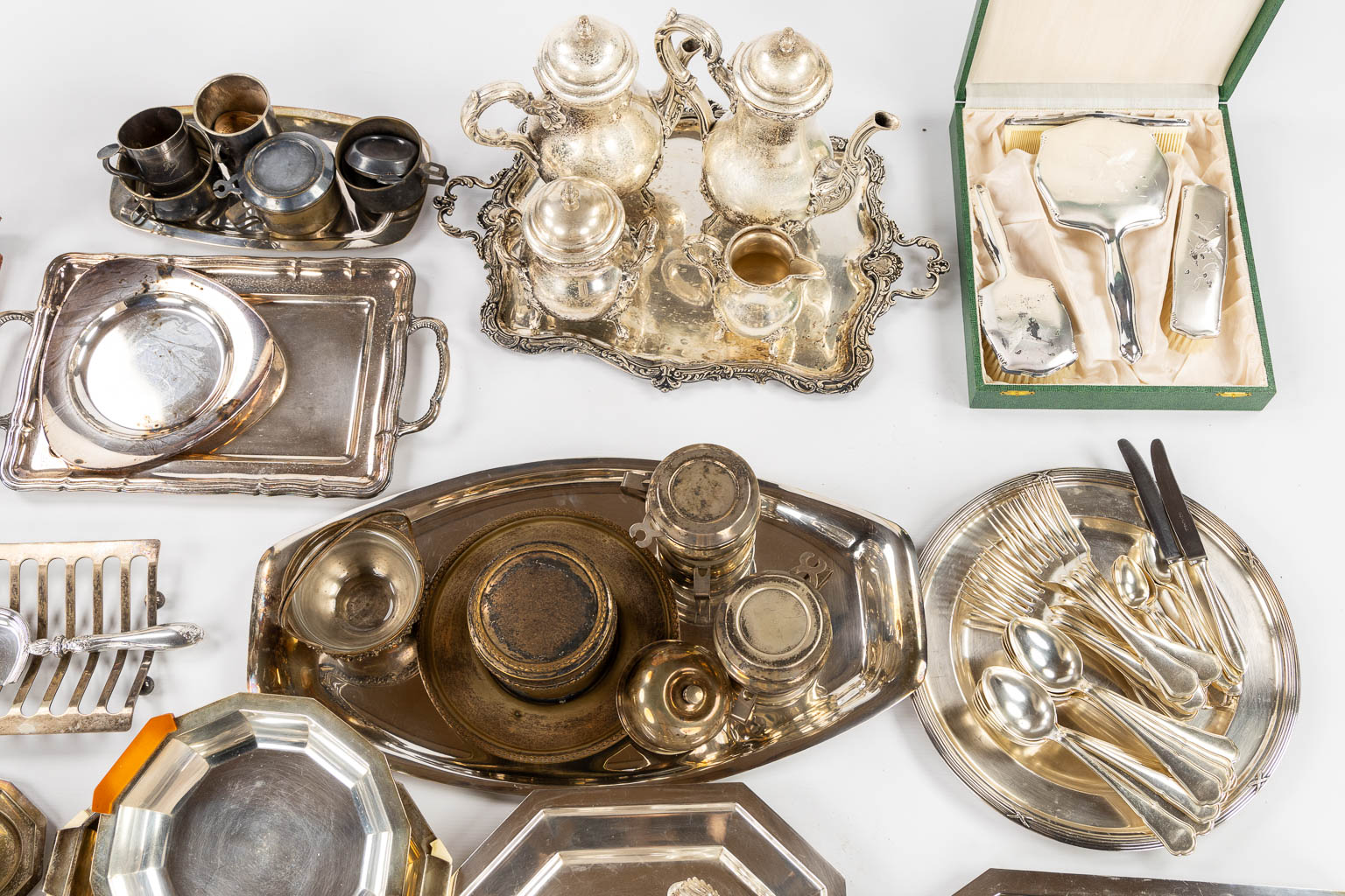 A large collection of table accessories and serving ware, silver plated metal. 