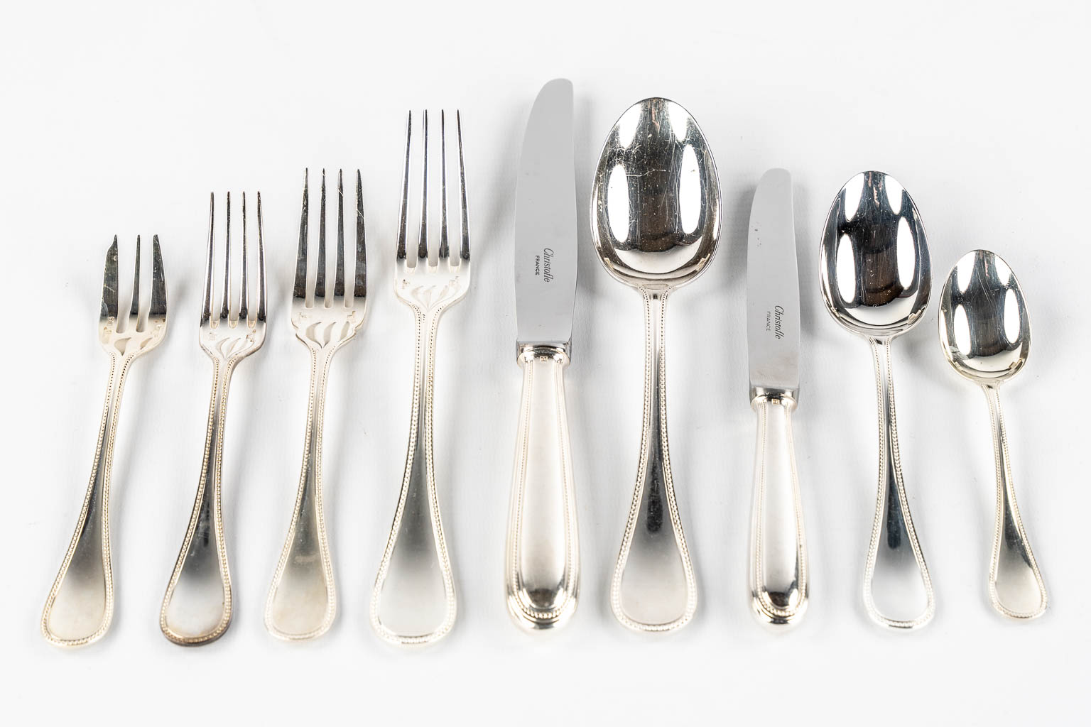 Christofle 'Perles' a 142-piece silver-plated cutlery in a Christofle chest with drawers. 