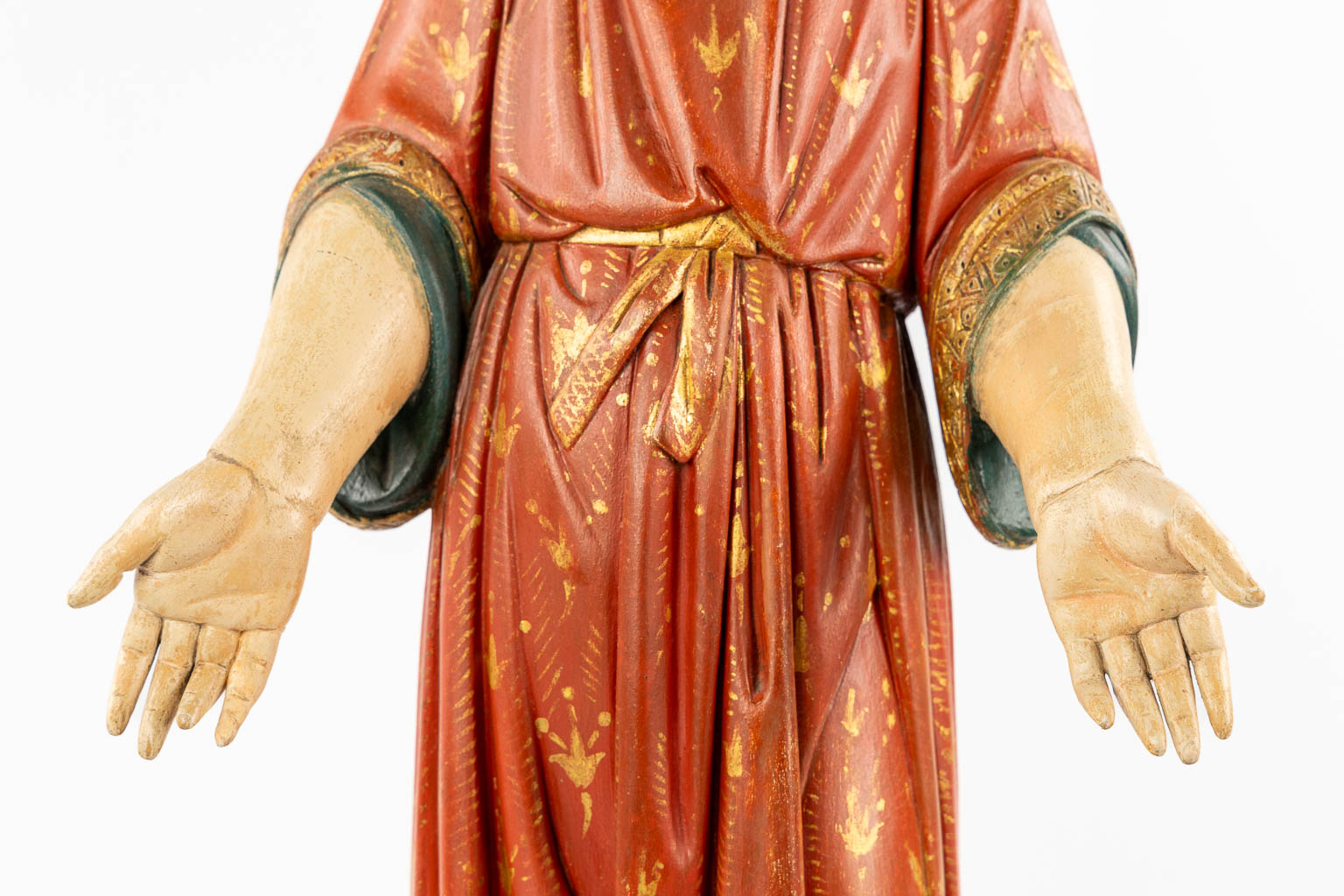 An antique wood-sculptured and richly patinated figurine of Jesus Christ. (c.1900)