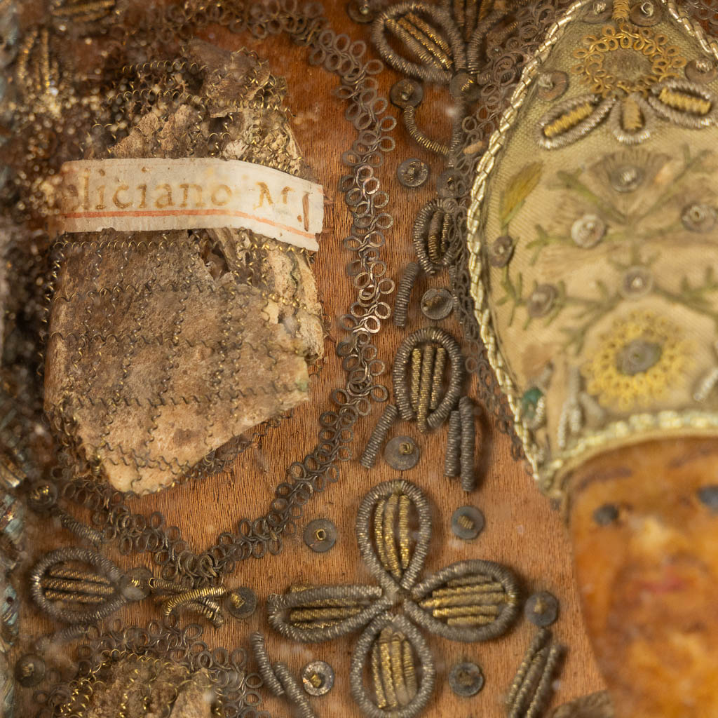 A large reliquary box with 5 relics and a wax figurine, Saint Vincent, Martyr. (W:16 x H:21 cm)