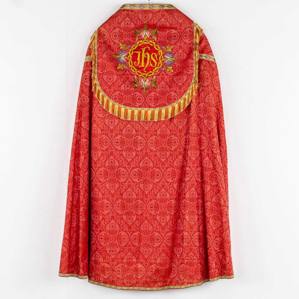 A Cope, a pair of Dalmatics and Two Roman Chasubles, Embroideries.