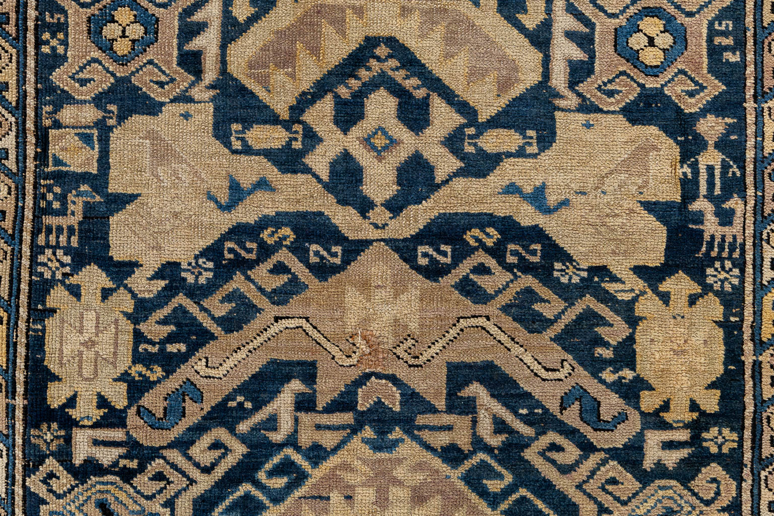 An Oriental hand-made carpet, Caucasian. (W:160 x H:318 cm)