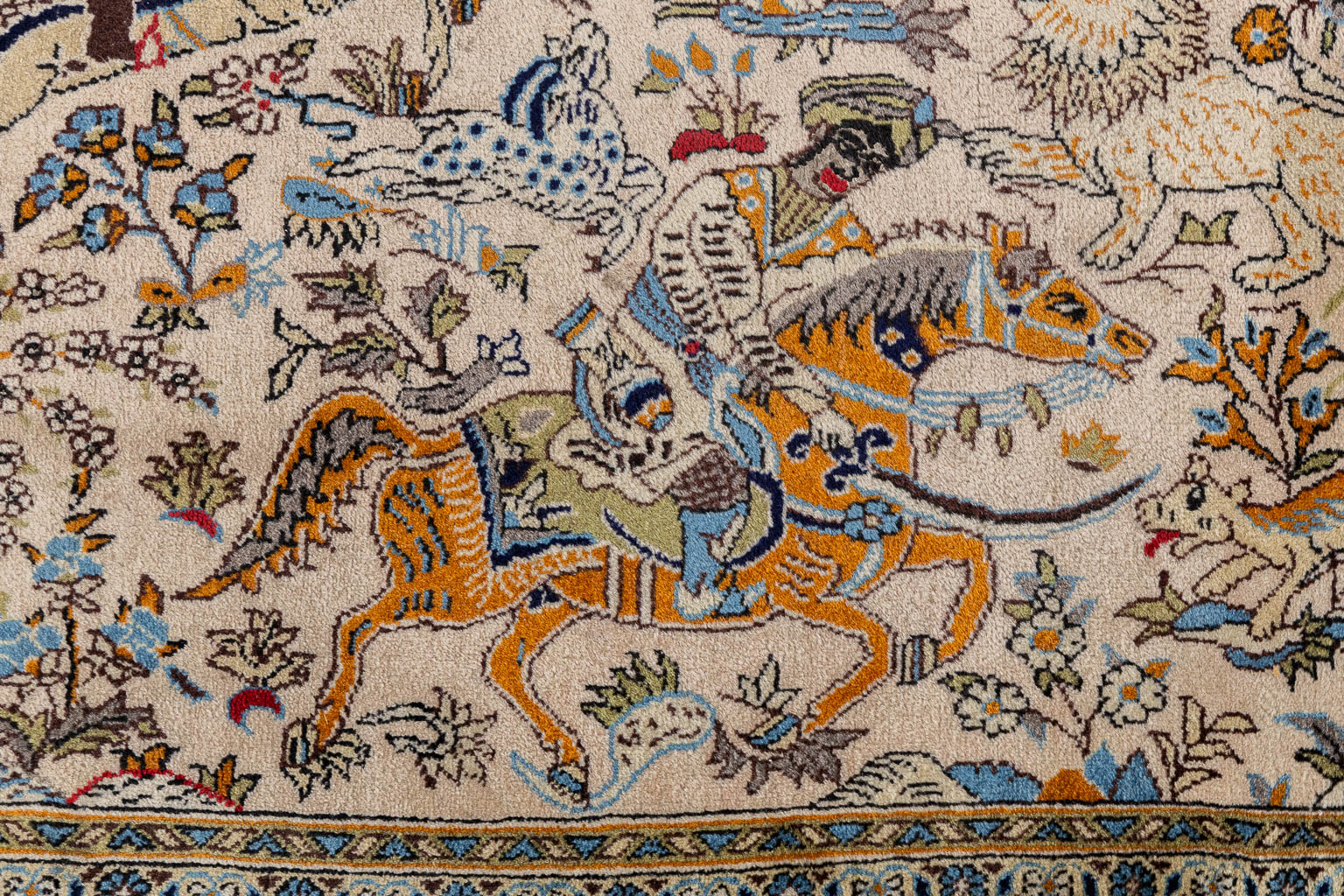 An Iranian hand-made carpet with equestrian hunting decor, Isphahan/Isfahan. (L:82 x W:120 cm)