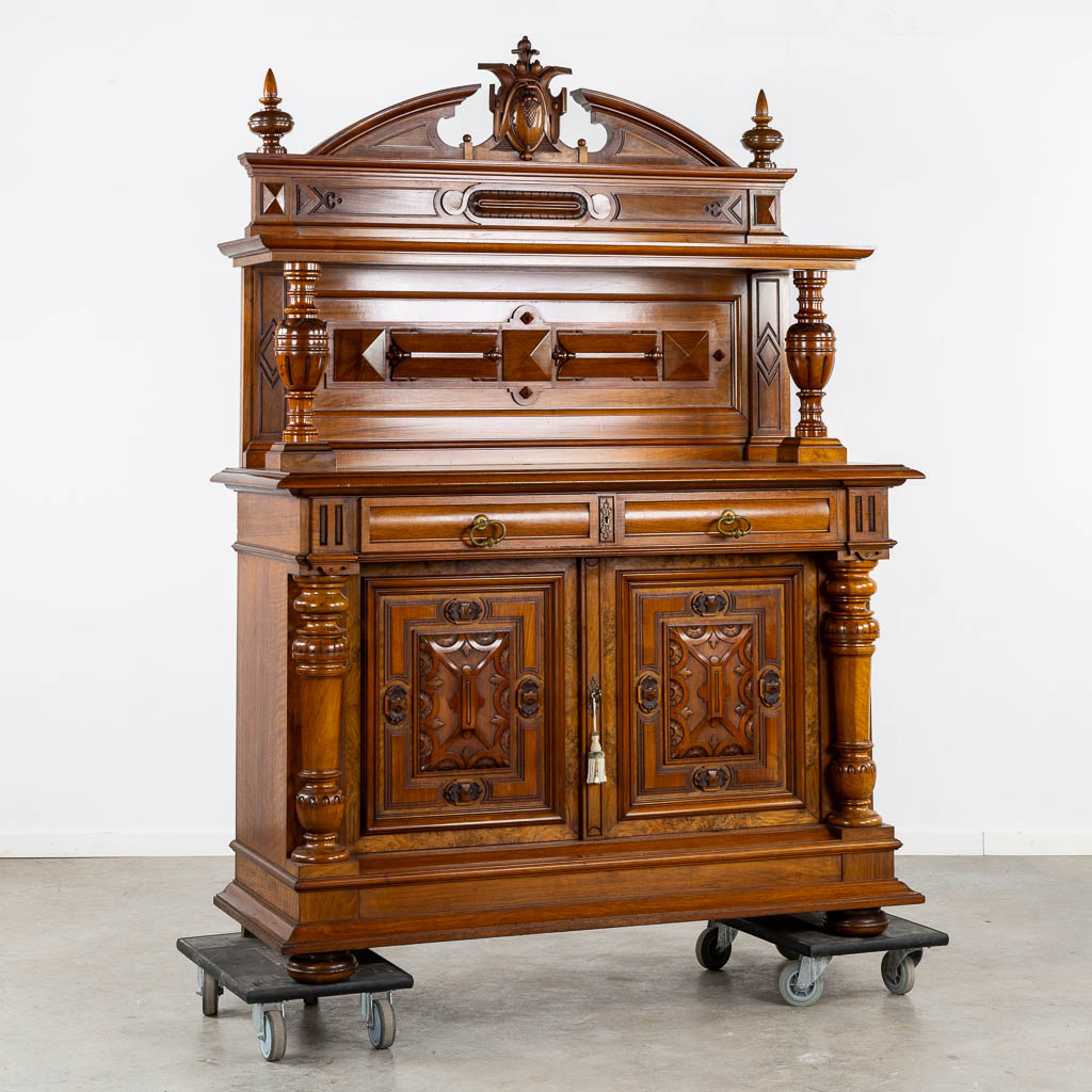 Arthur Etienne & Soeur, Bruxelles, a walnut dresser, Henry Deux. 19th C. (L:61 x W:150 x H:208 cm)