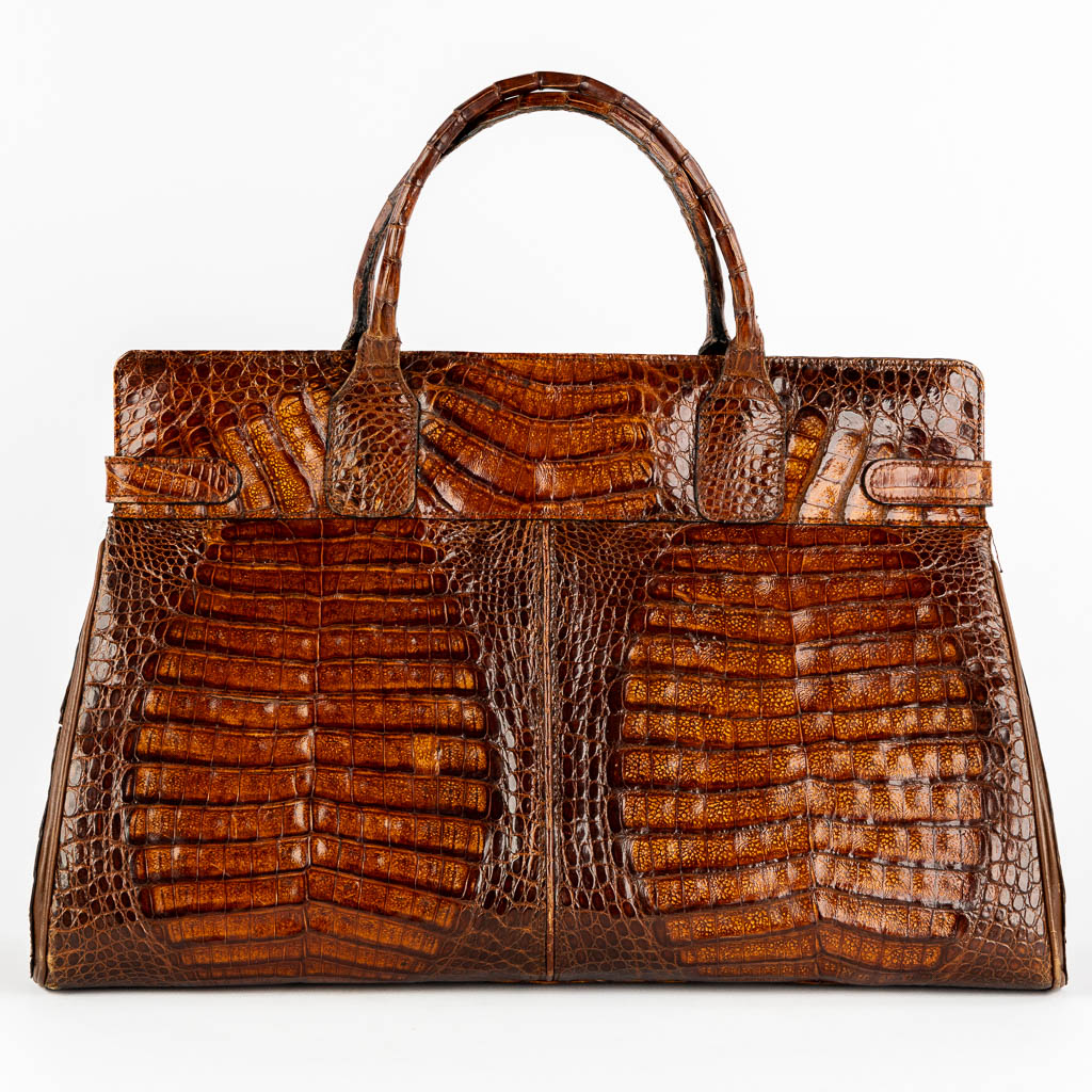 A vintage handbag, crocodile leather and gold-plated hardware. 