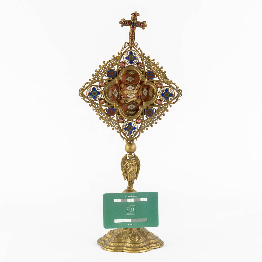 A reliquary monstrance with 6 relics, spelter and cloisonné enamel. 1901. (W:16 x H:36 cm)