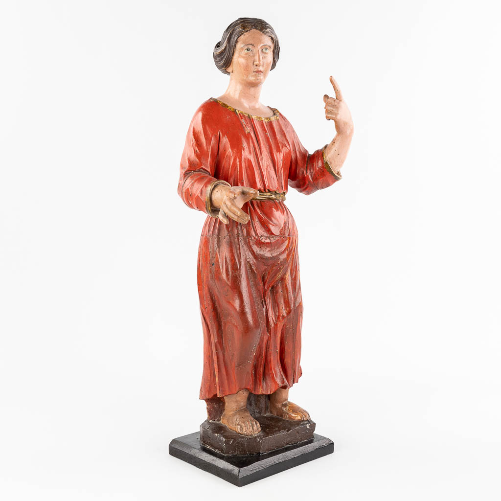 An antique wood-sculptured and polychrome figurine of a noble lady. 18th/19th C. (L: 20 x W: 25 x H: 60 cm)