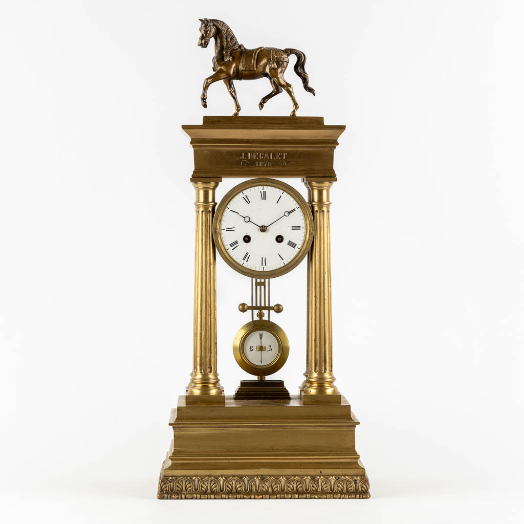 An antique column clock, bronze with a horse figurine. 19th C. (L:18 x W:27 x H:62 cm)