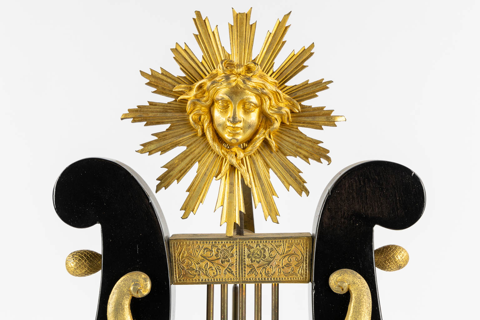 A Lyre mantle clock, gilt bronze and marble. 19th C. (L:13 x W:22 x H:61 cm)