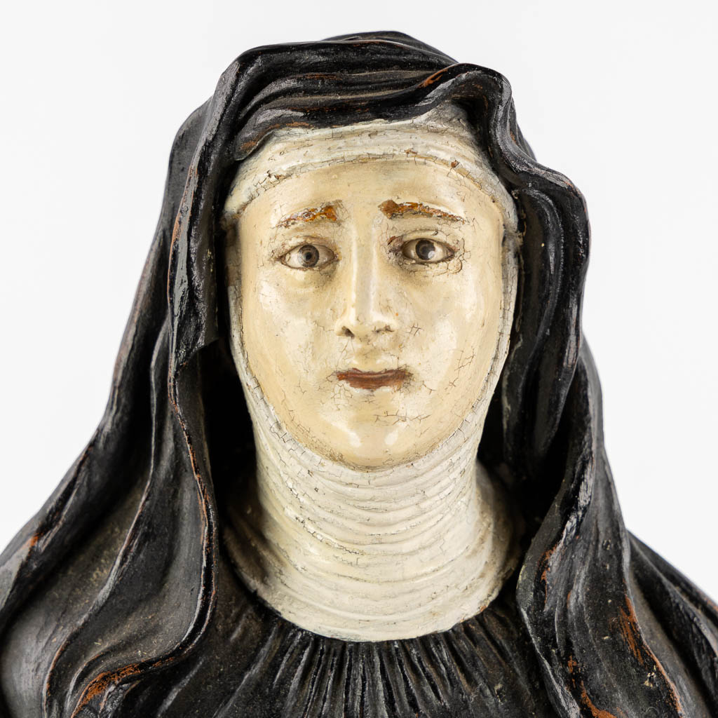 Saint Genoveva of Paris, polychrome terracotta with glass eyes. (W:17 x H:54 cm)