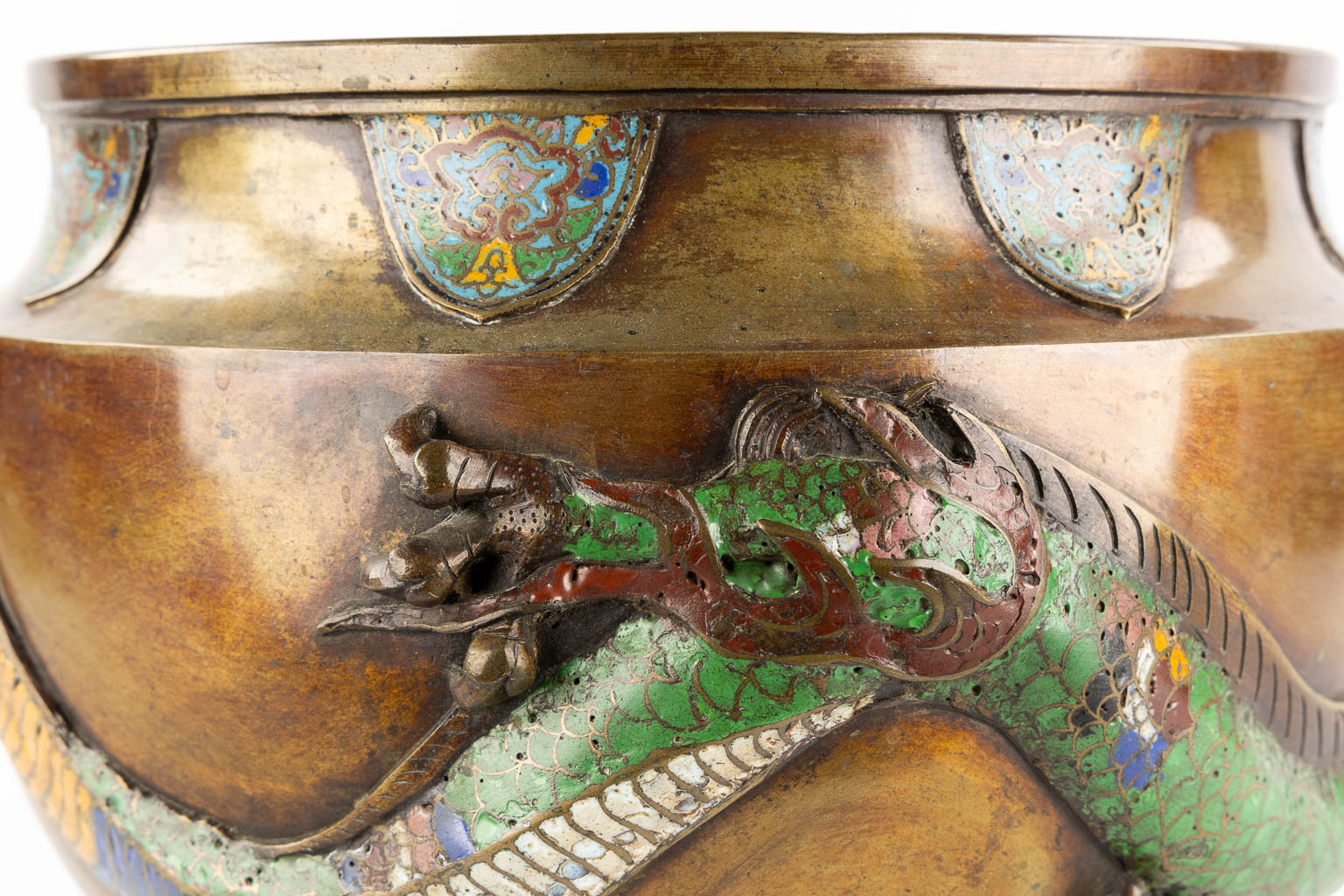 A Jardinière or Cache-Pot, Relief dragon decor and finished with Chamsplevé enamel. (H:27 x D:38 cm)