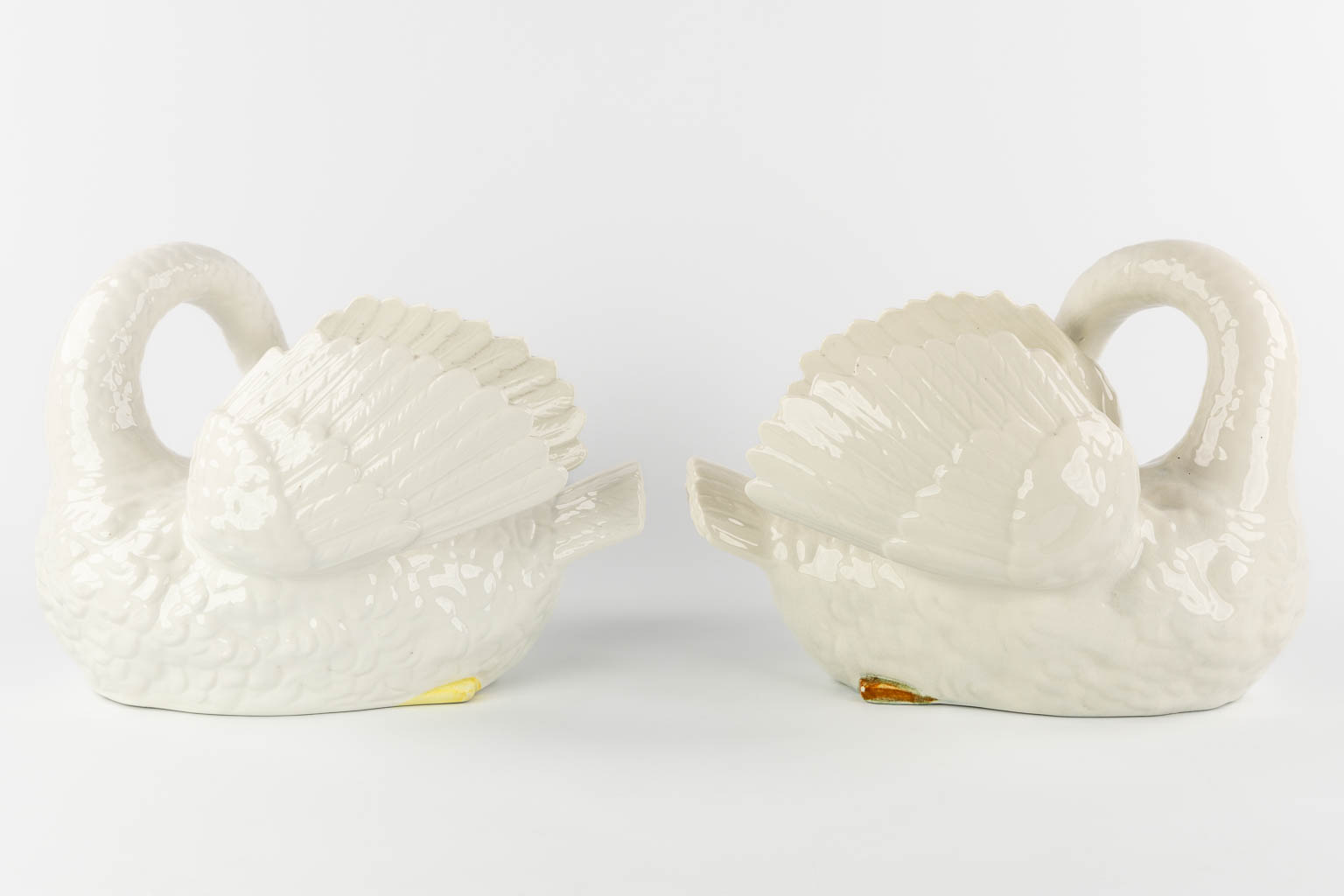 Nimy, a pair of figurative cache-pots, Swans.