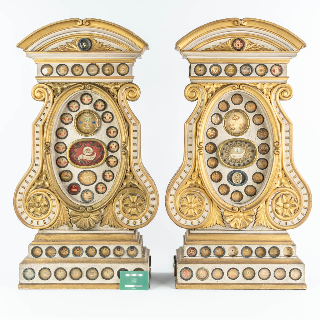 A pair of large reliquary cabinets with 95 theca, of which 65 have documents. Neoclassical style, 19th C.