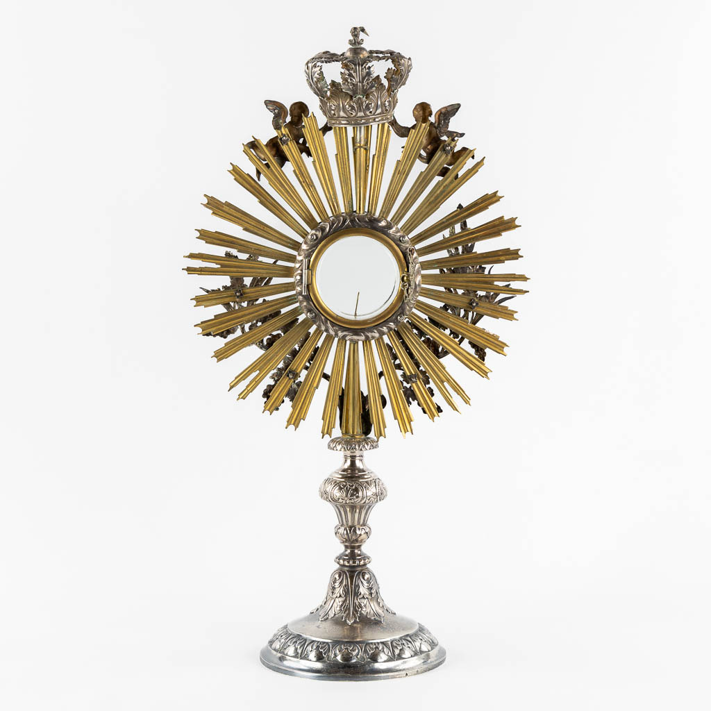 A sunburst monstrance, silver and brass, Henricus De Curte, Ghent, circa 1868. (W:30 x H:55 cm)