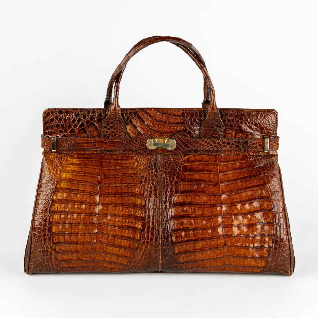 A vintage handbag, crocodile leather and gold-plated hardware. 