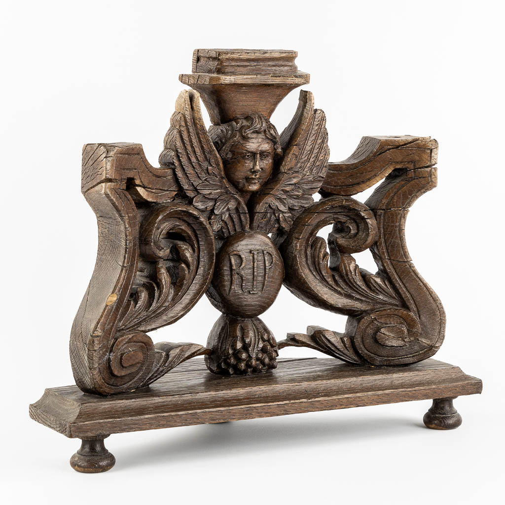 An antique wood-sculptured angel. 