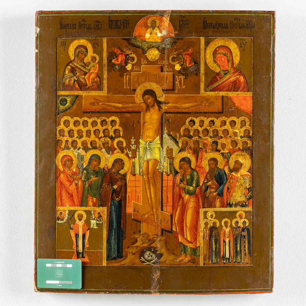 A Crucifixion Icon, Saint Nicholas, Mother God and various other saints. 19th C. (W:45,5 x H:53 cm)