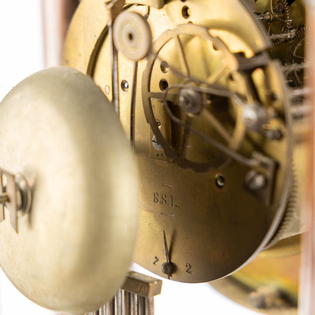 A column clock, marquetry inlay and gilt bronze. 19th C. (L:15 x W:25 x H:46 cm)