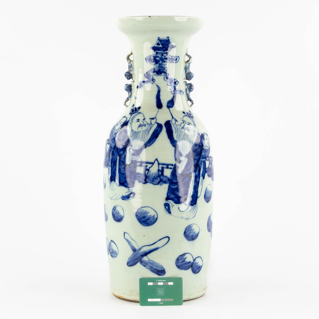 A Chinese vase, blue-white decor with wise men and children. (H:56,5 x D:21 cm)