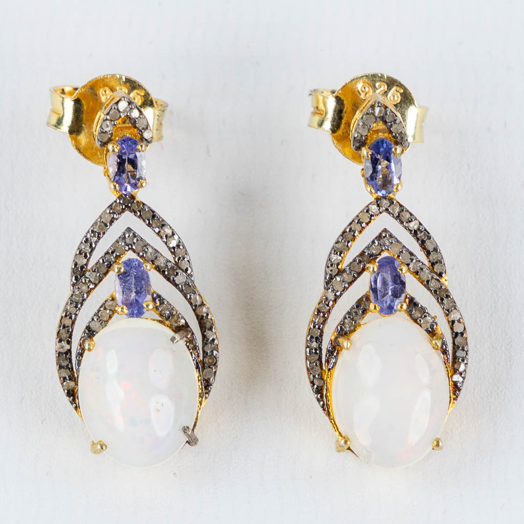 A pair of earrings, vermeil and silver with an Opal cabochon, Tanzanite and old-cut diamonds. (H:3 cm)