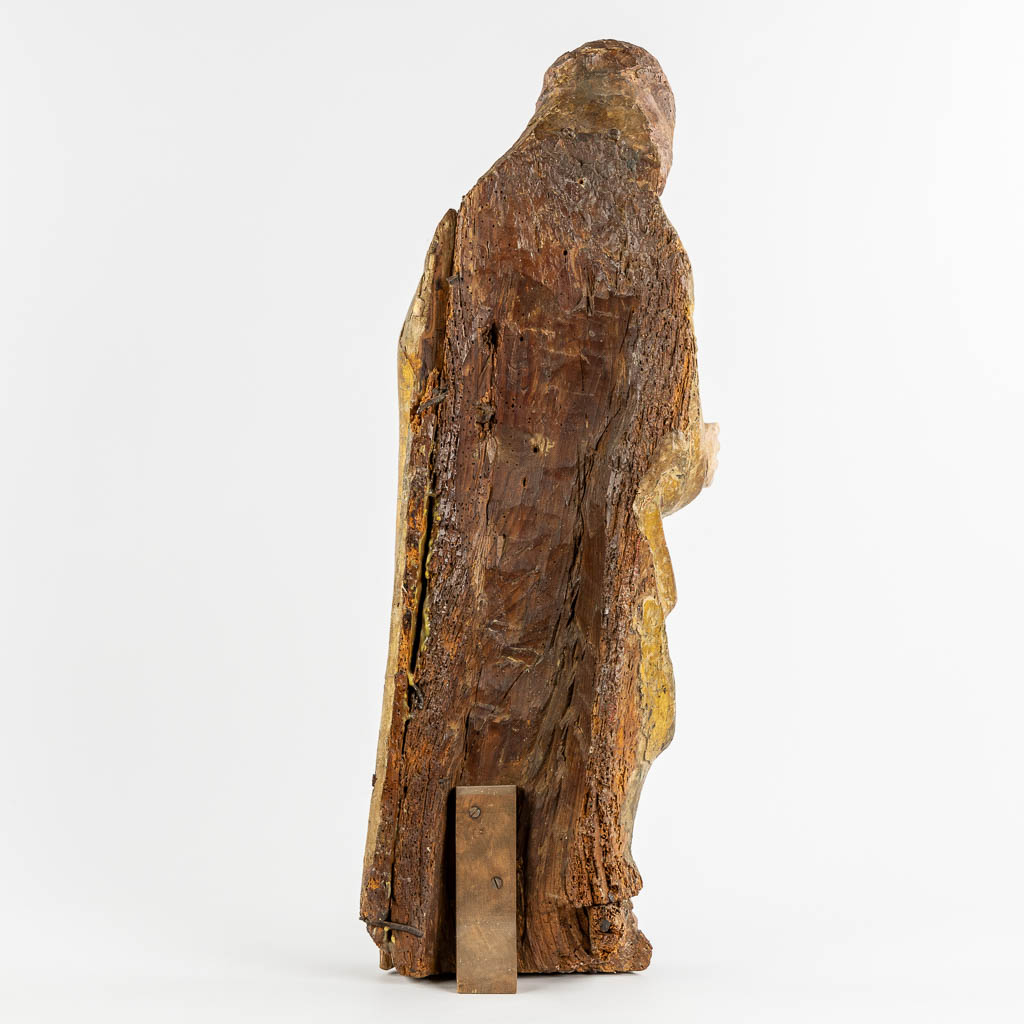 An antique wood sculptured figurine of a saint, polychrome, 14th C. (W:27 x H:78 cm)