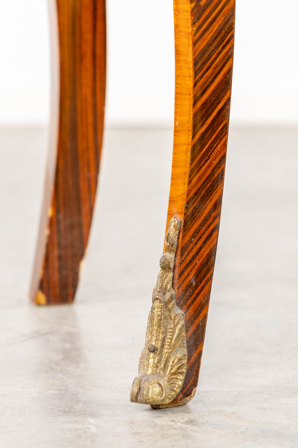 A two drawer side cabinet, marquetry inlay with a marble top. (L:39 x W:72 x H:81 cm)