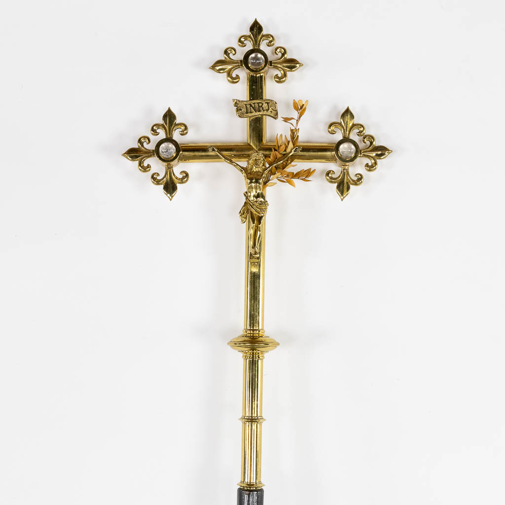 A bronze processional crucifix, richly decorated with cabochons. (W:33 x H:59 cm)