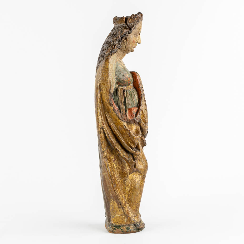 Saint Ursula, princess of Bretagne, a wood sculpture, Rhineland, Late 14th C. (L:13 x W:17 x H:58 cm)