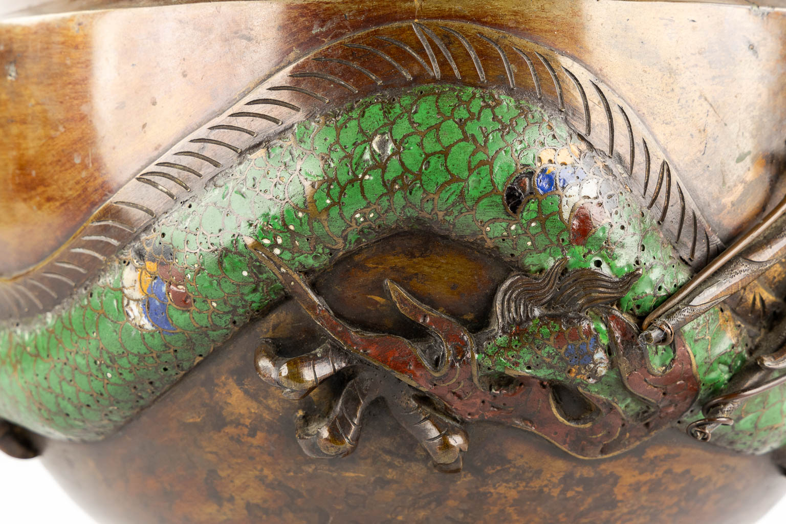 A Jardinière or Cache-Pot, Relief dragon decor and finished with Chamsplevé enamel. (H:27 x D:38 cm)