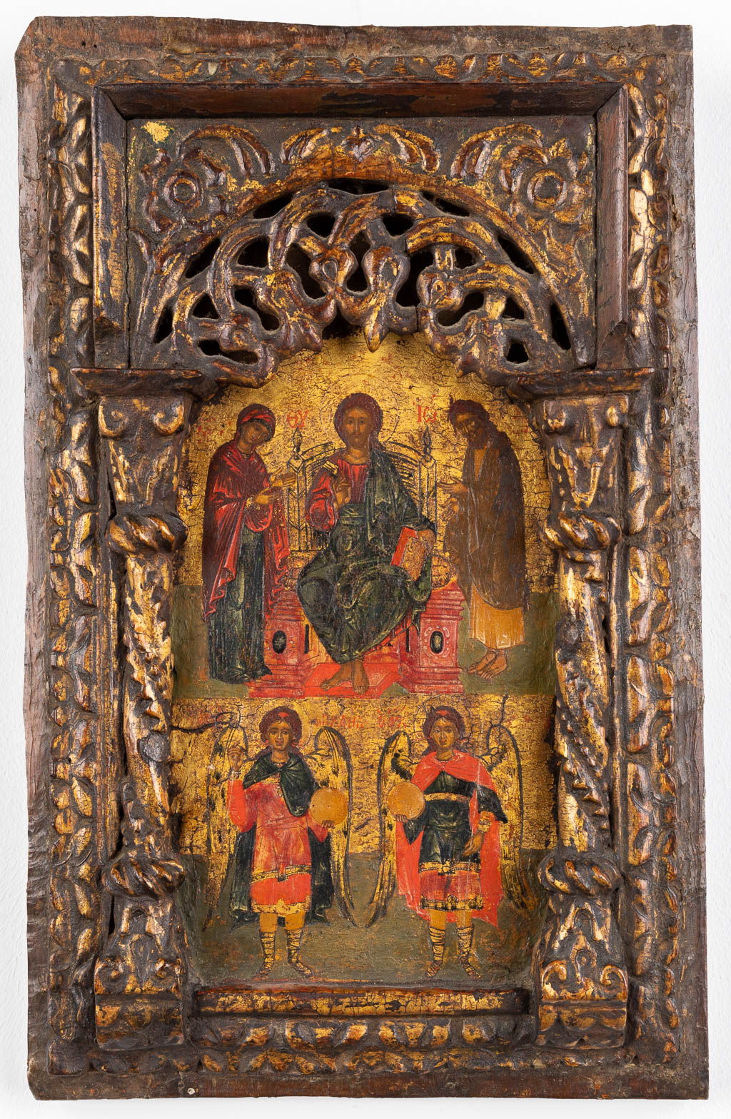 An Eastern European icon, with images of Jesus Christ and the Archangels. Oil on panel. 19th C.  (W:26 x H:40 cm)