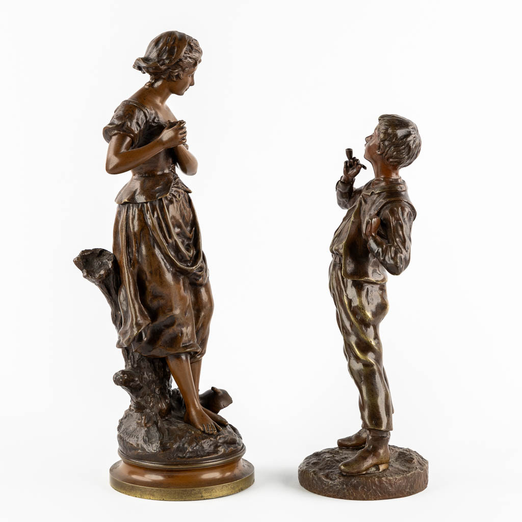 Twee gepatineerde bronzen figuren van een Dame en Roker, circa 1900.