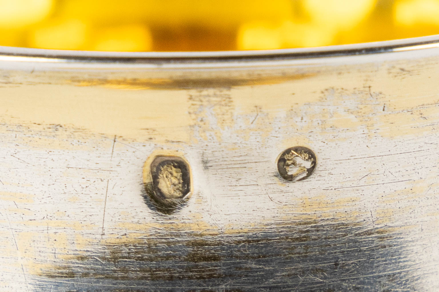 Two chalices with a silver cuppa, on a silver-plated and copper base.