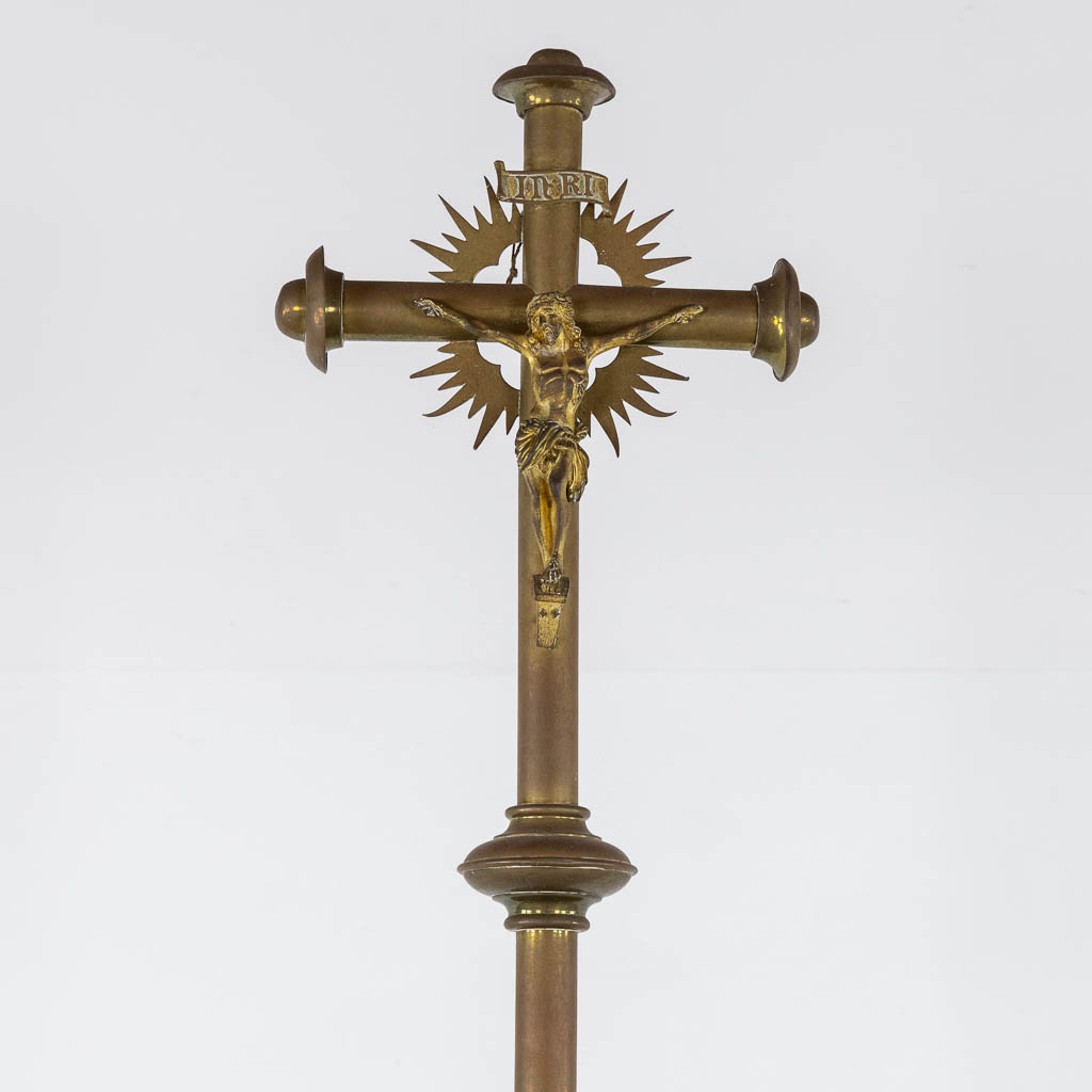 Four Processional crucifixes with their stands. Silver-plated metal and Brass. (H:265 cm)