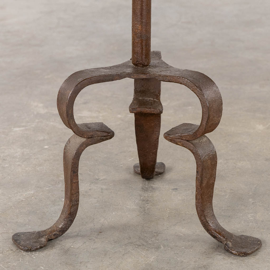 A wrought-iron lectern. 19th C. (W:40 x H:136 cm)