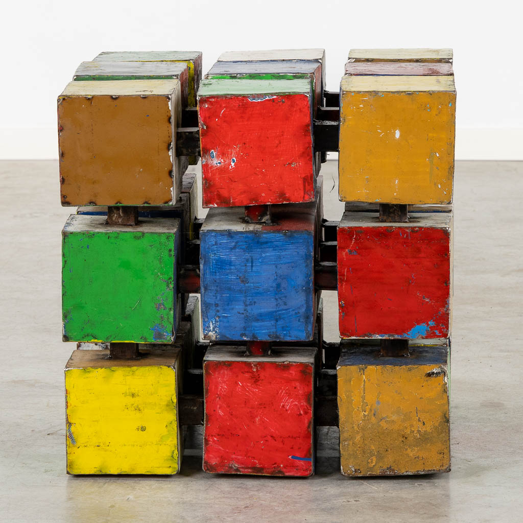 A mid-century side table in the shape of a Rubik's Cube 