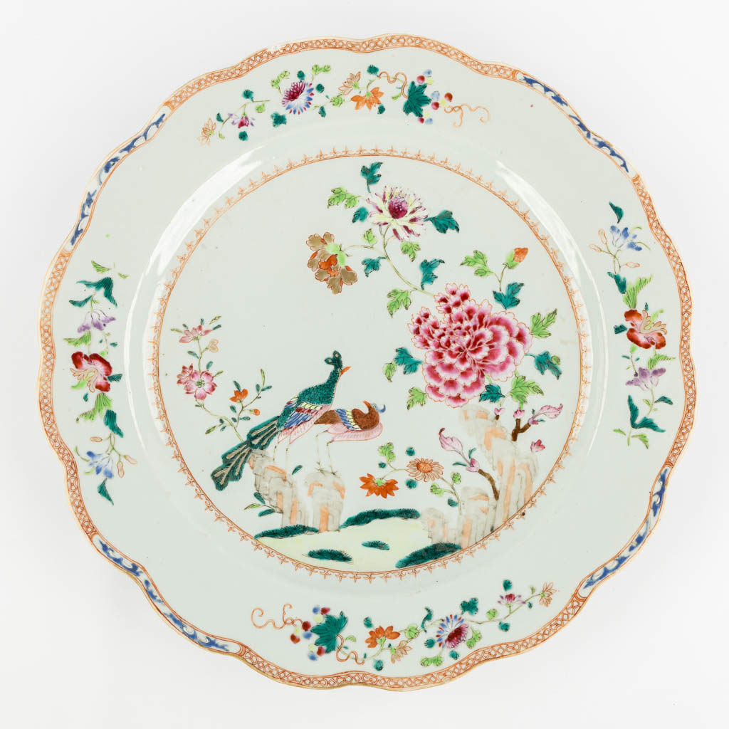 Two large Chinese Famille Rose plates, Double Peacock decor. 18th C. (D:41 cm)