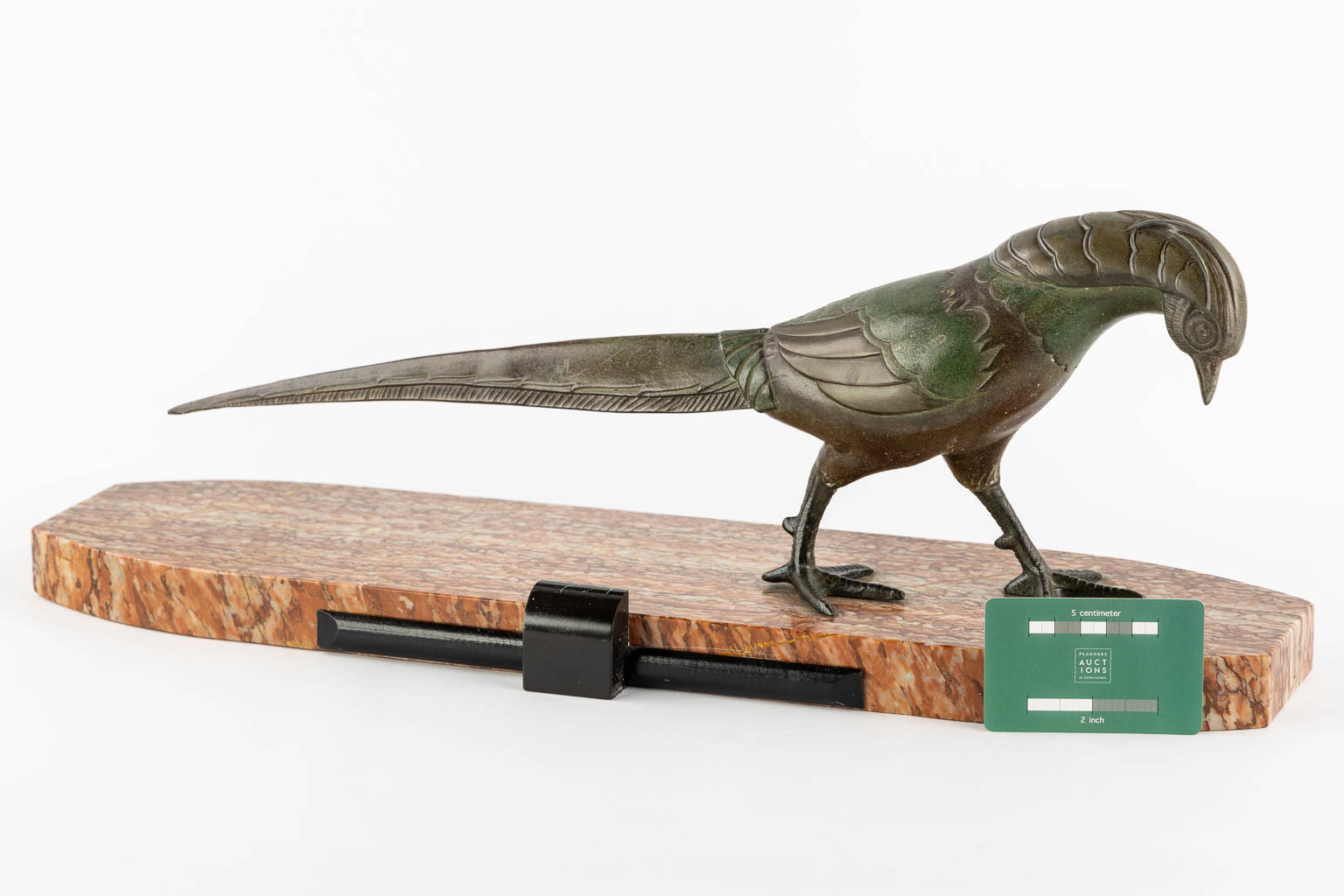 A figurine of a Pheasant, in the style of Rochard. Spelter. Art Deco. (L:16 x W:56 x H:20,5 cm)